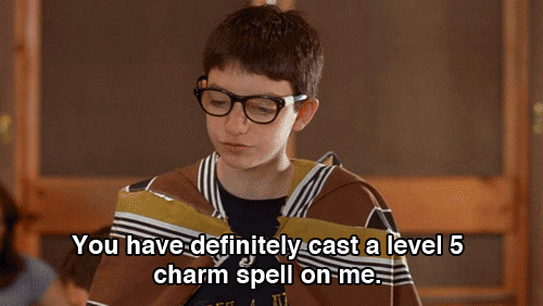 Nerd Boy Wearing Eyeglasses Reading Charm Spells GIF