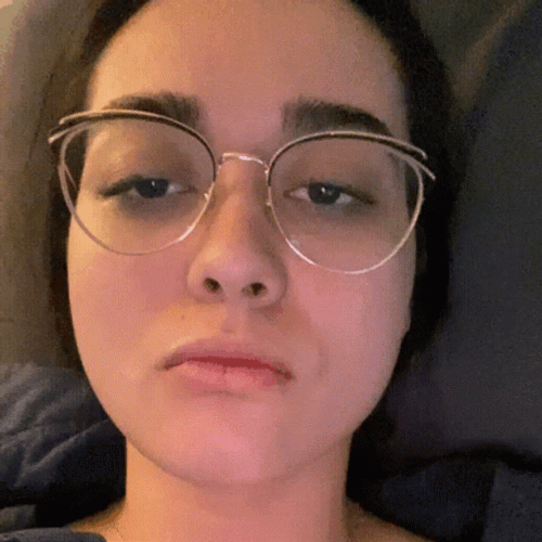 Nerdy Becca Spit To Camera GIF