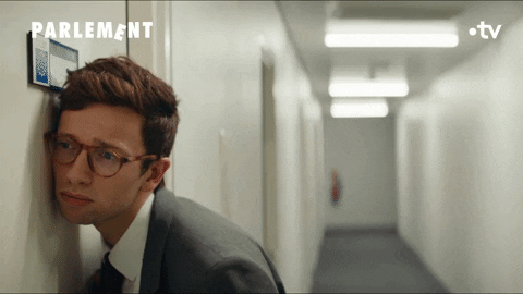 Nerdy Guy Stalking On Door GIF