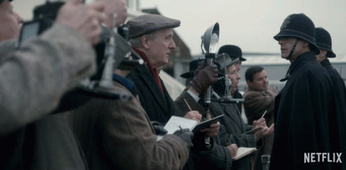 Netflix Ad Group Of Men Taking Notes GIF