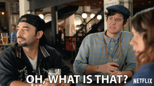 Netflix Ad Showing Two Men Sitting at Table Talking