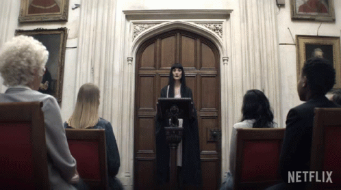 Netflix Ad Woman Giving Speech to Group of Women