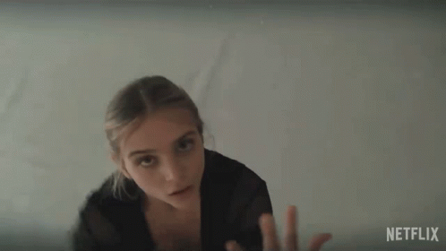 Netflix Ad Woman In Black Top GIF