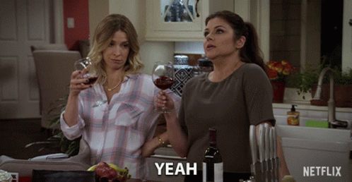 Netflix Ad Women Toasting With Wine GIF