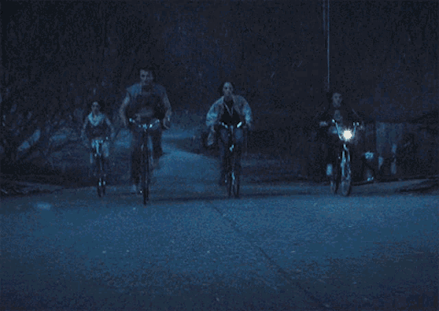 Netflix Series Stranger Things Characters Riding Bike GIF
