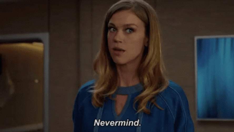 Nevermind Woman In Blue Looking Pissed GIF