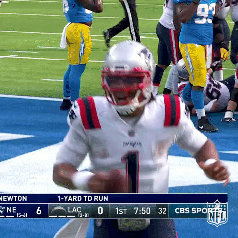 New England Patriots Player Running With Ball