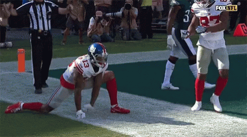 New York Giants Football Player Kneeling