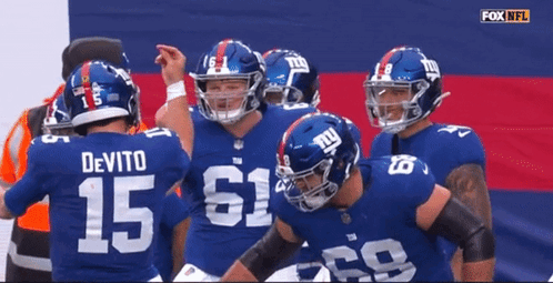 New York Giants Football Players Including Devito GIF