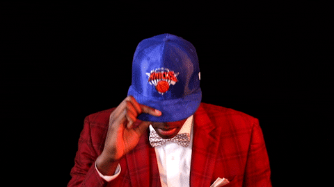 New York Knicks Frank Ntilikina Pointing On Cap GIF