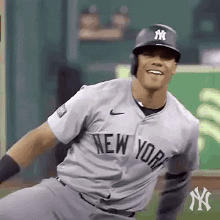 New York Yankees Baseball Player Smiling Running