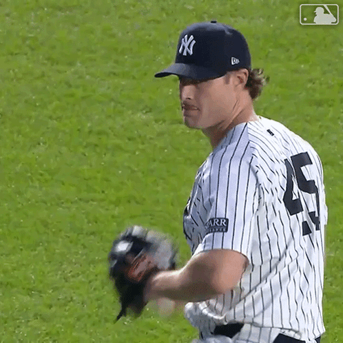New York Yankees Player Number 5 Throws Baseball