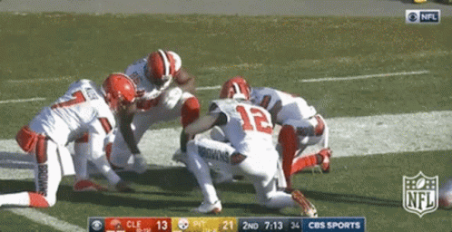NFL Players Kneeling On Field GIF