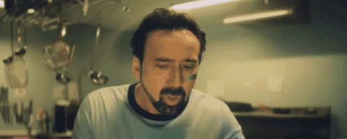 Nervous Nic Cage Frantic Drinking GIF