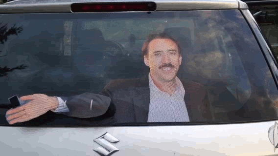 Nic Cage Car Wiper Waving Hello Meme GIF