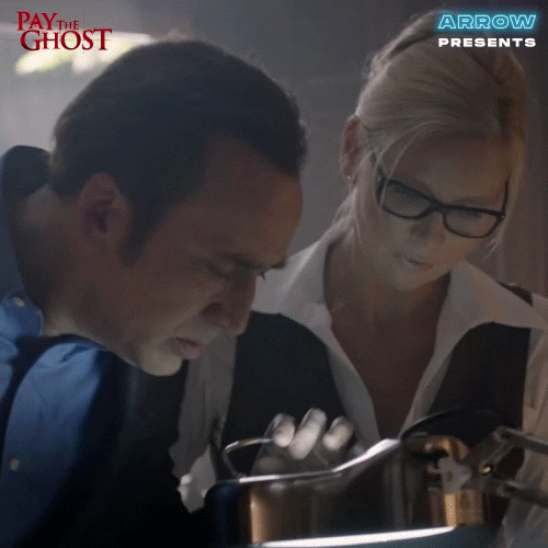 Nic Cage Inspecting Device Pay The Ghost GIF