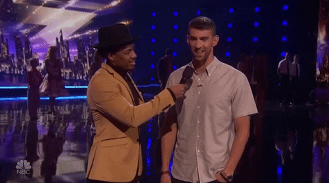 Nick Cannon Interviewing Michael Phelps GIF