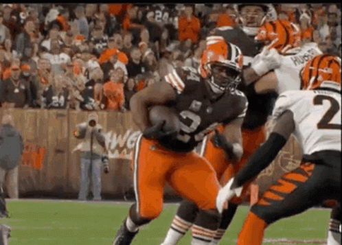 Nick Chubb Jumping Over An Opponent GIF