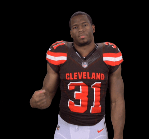 Nick Chubb Showing Off Arm Muscle GIF