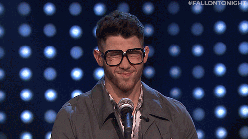 Nick Jonas Drenched With Water GIF