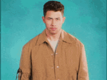 Nick Jonas Pretends To Be Shocked GIF