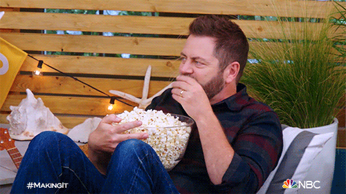 Nick Offerman Ate Popcorn While He Spill The Tea GIF