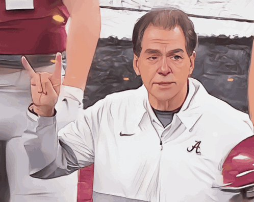 Nick Saban Gesturing Hook Em Sign GIF