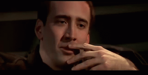 Nicolas Cage Thrilled Touching Lips Laugh GIF