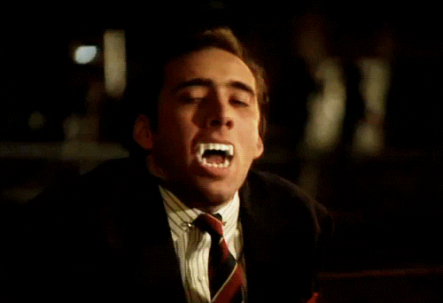 Nicolas Cage Fake Vampire Teeth GIF