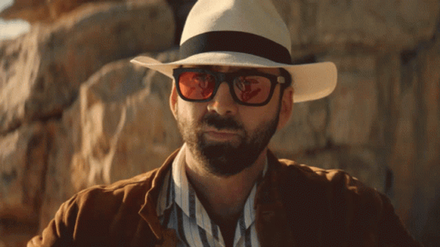 Nicolas Cage Hand Salute Bow GIF