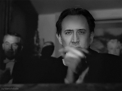 Nicolas Cage Monotone Blank Stare Clapping GIF