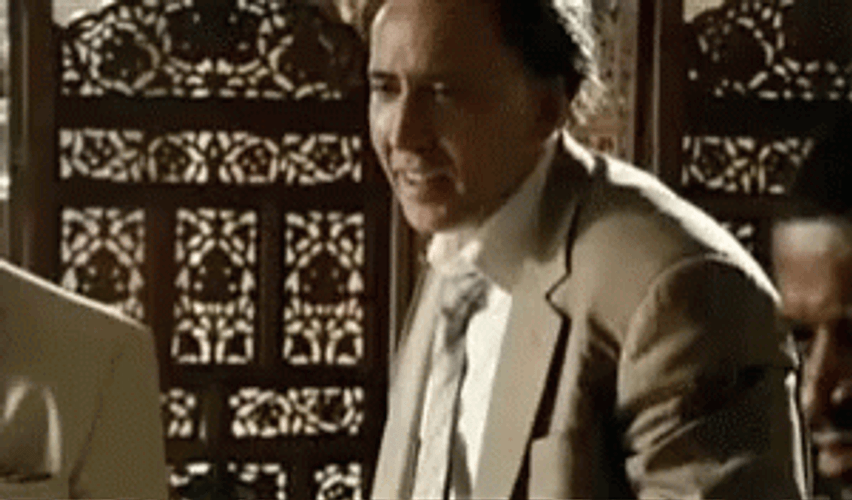 Nicolas Cage Wicked Smirk GIF