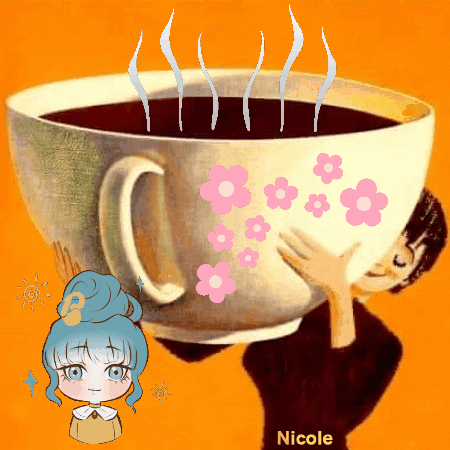Nicole Holding Cup of Coffee