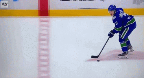 Nils Hoglander Bumping Player In Hockey Game GIF