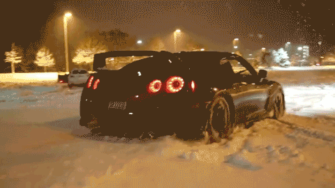 Nissan Skyline R34 Speeding Up Snowy Road GIF