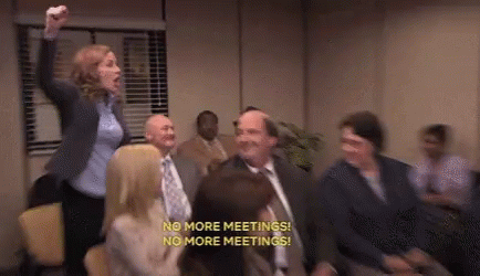 No More Meetings Group Sitting in Room