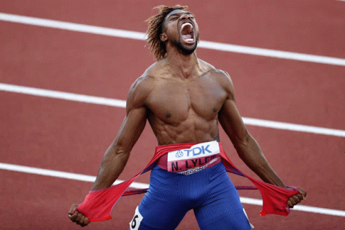 Noah Lyles Cuts Clothes GIF
