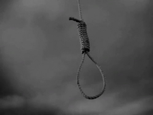 Noose Hanging From Rope in Sky