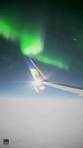 Northern Lights Near The Plane GIF