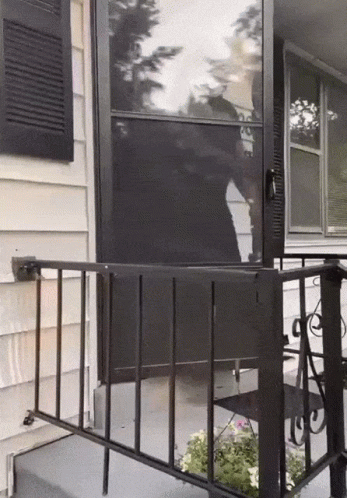 Nosy Man Pretending To Clean The Door GIF
