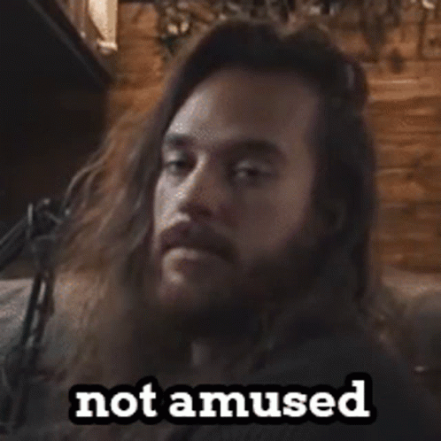 Long Haired Guy Not Amused GIF