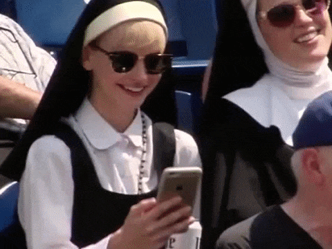 Nun Selfie With Beer GIF