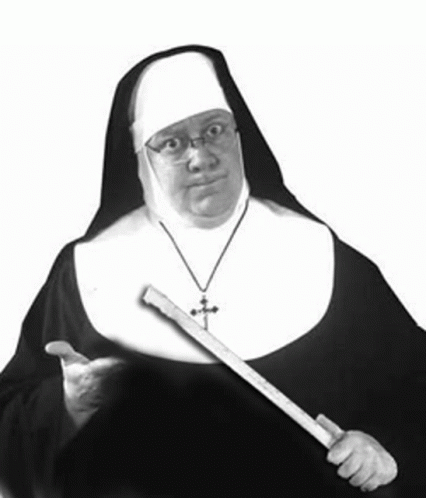 Nun With Glasses Holding Wooden Stick