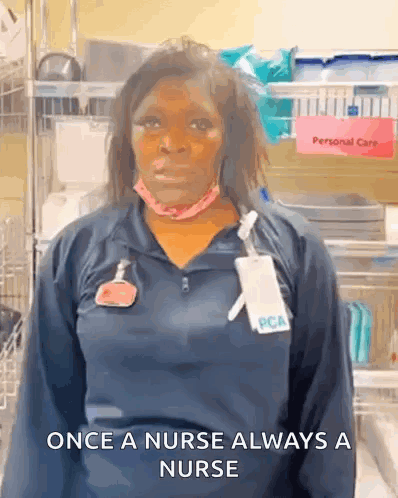 Nurse Wearing Mask and Name Tag