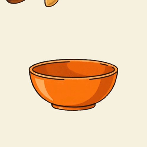 Nuts and Chocolate Falling Into Cereal Bowl