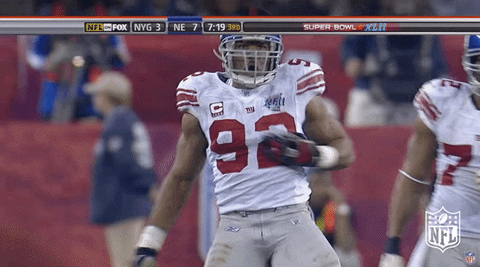 Ny Giants Player Flexing His Biceps GIF
