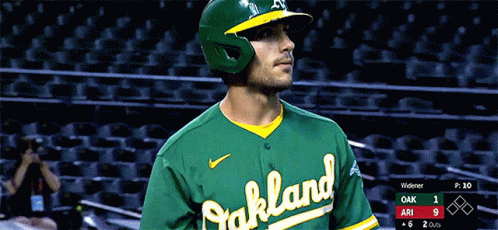 Oakland A's Baseball Player in Dugout