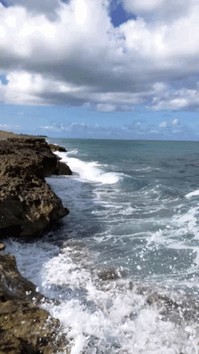 Ocean Waves Hitting Big Rocks GIF