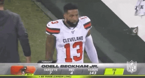 Odell Beckham Jr Walking While Doing Peace Sign GIF