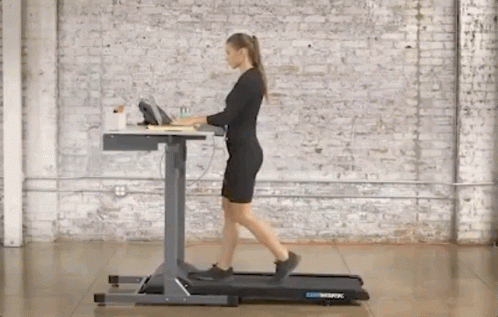 Office Girl Walking On Treadmill GIF